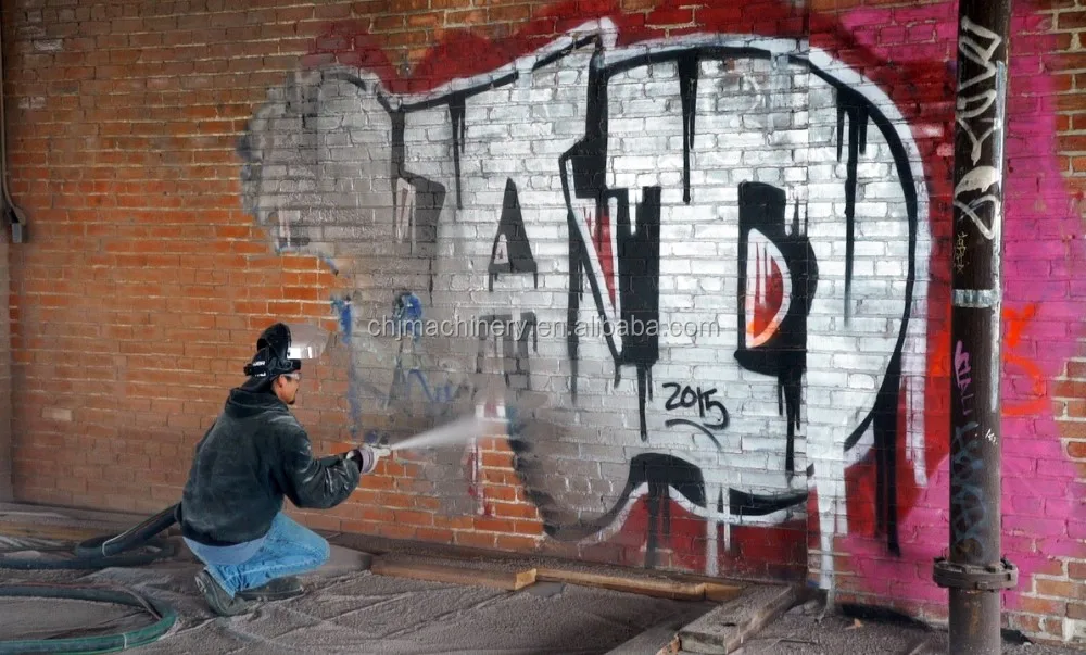 Wet bead blasting machine for paint off concrete block wall