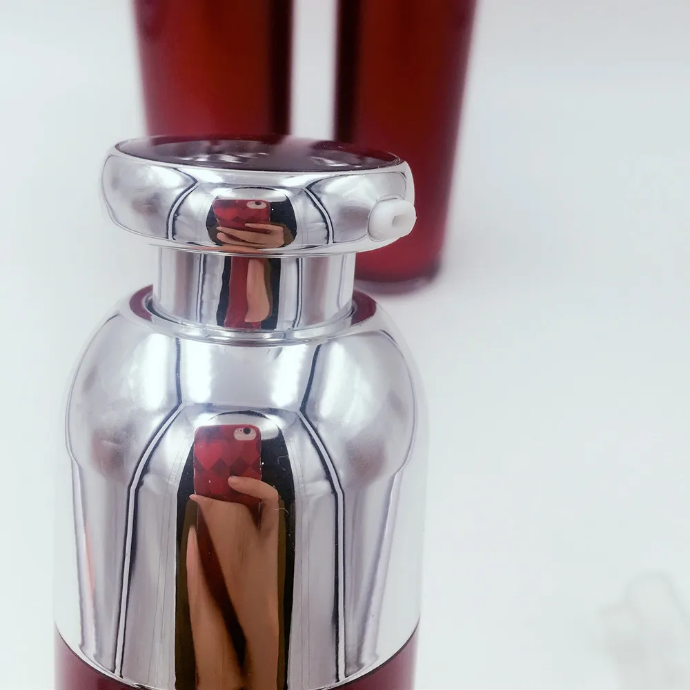 
China factory luxury red cosmetic airless bottle for cosmetic packaging 