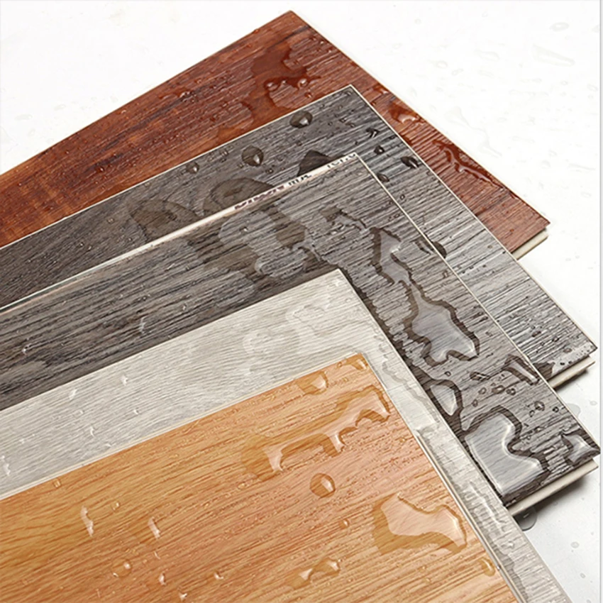 Floor tile 100% waterproof  protect the environment and wood color vinyl tile pvc floor