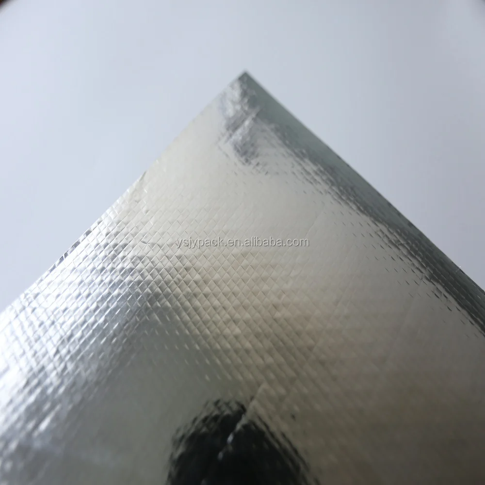 Double sided reflective aluminum coated pet film laminated woven fabric