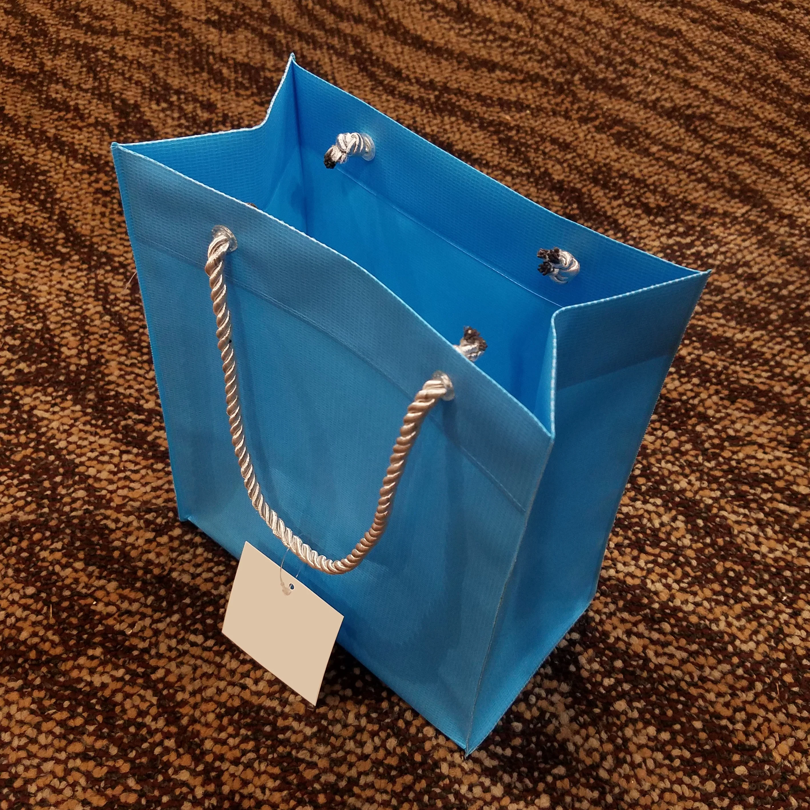 
Cheap Single Color EVA Promotional Handbag with Two String for Carrying 