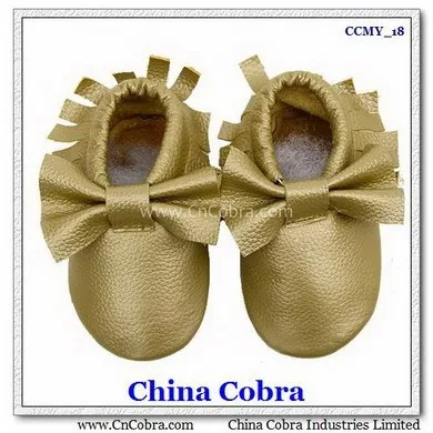 
CHINA COBRA top quality soft sole leather baby moccasins shoes without the characters on them with fringe on them 