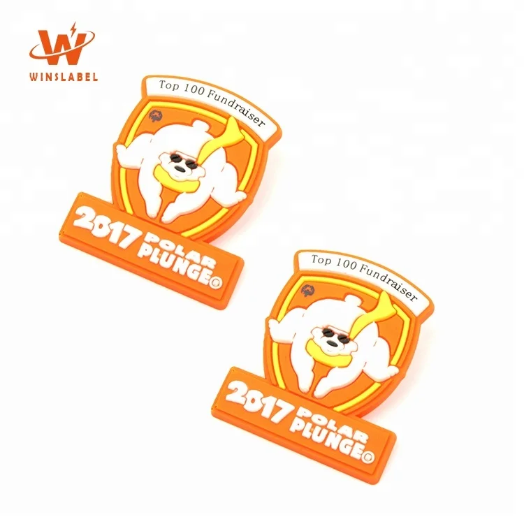 Shield Shape Custom Brand Raised Logo Soft Silicone Rubber Plastic PVC Pin Badges for Child Clothes