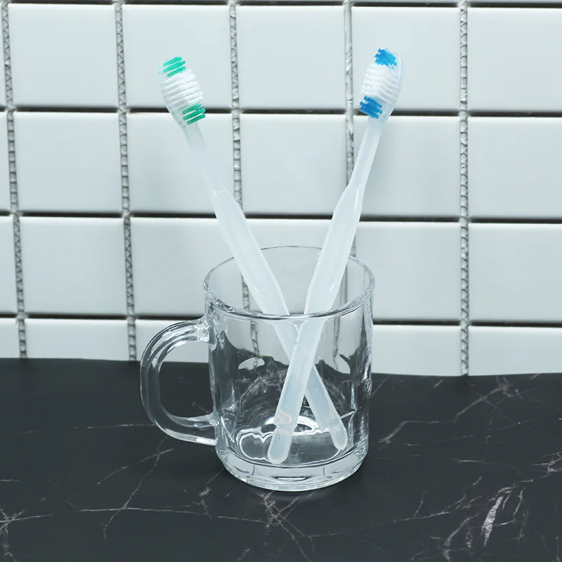 2022 Disposable toothbrush cheap for hotel travel wholesale custom factory customizable packaging logo