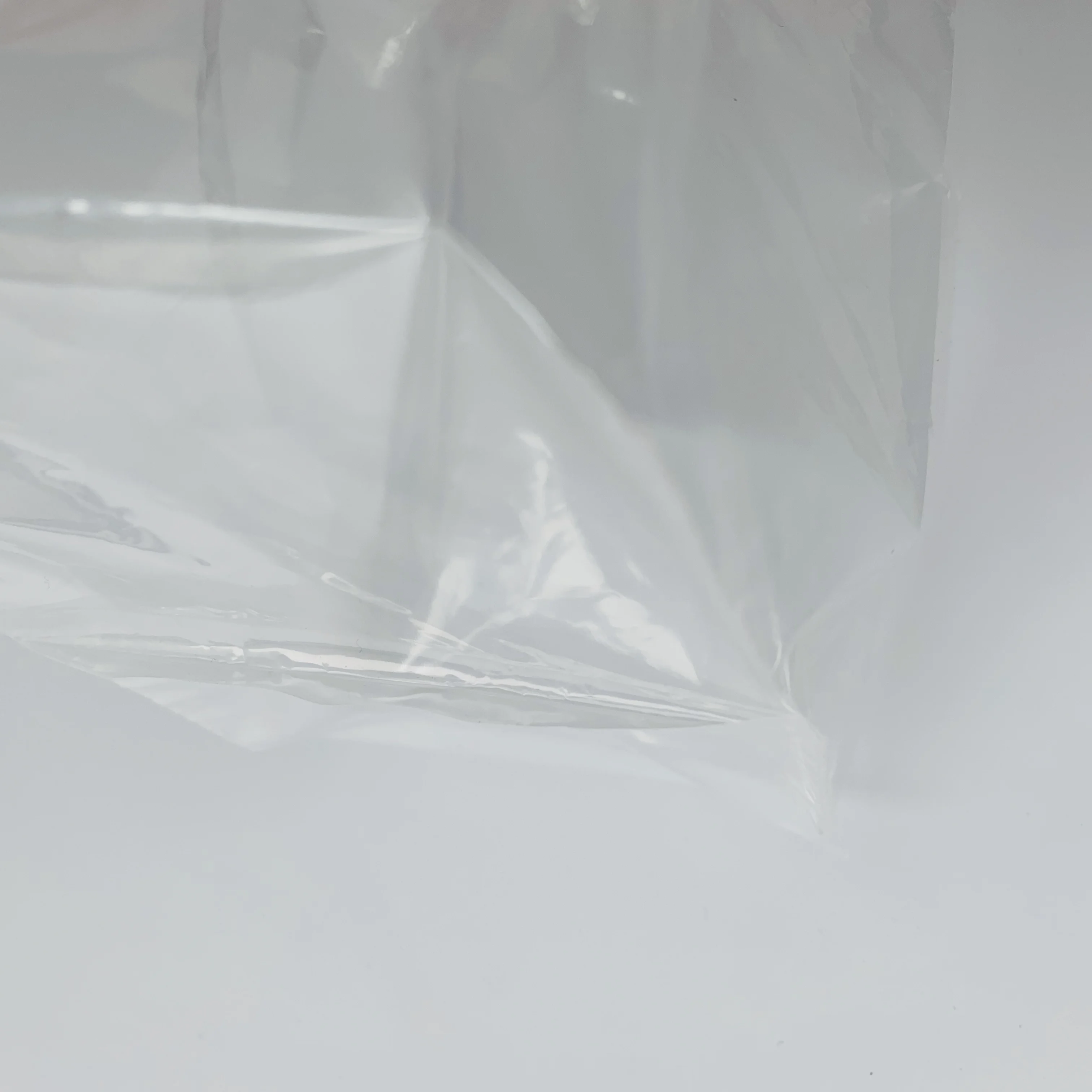 
clear transparent PE plastic square bottom bag with elastic band opening 