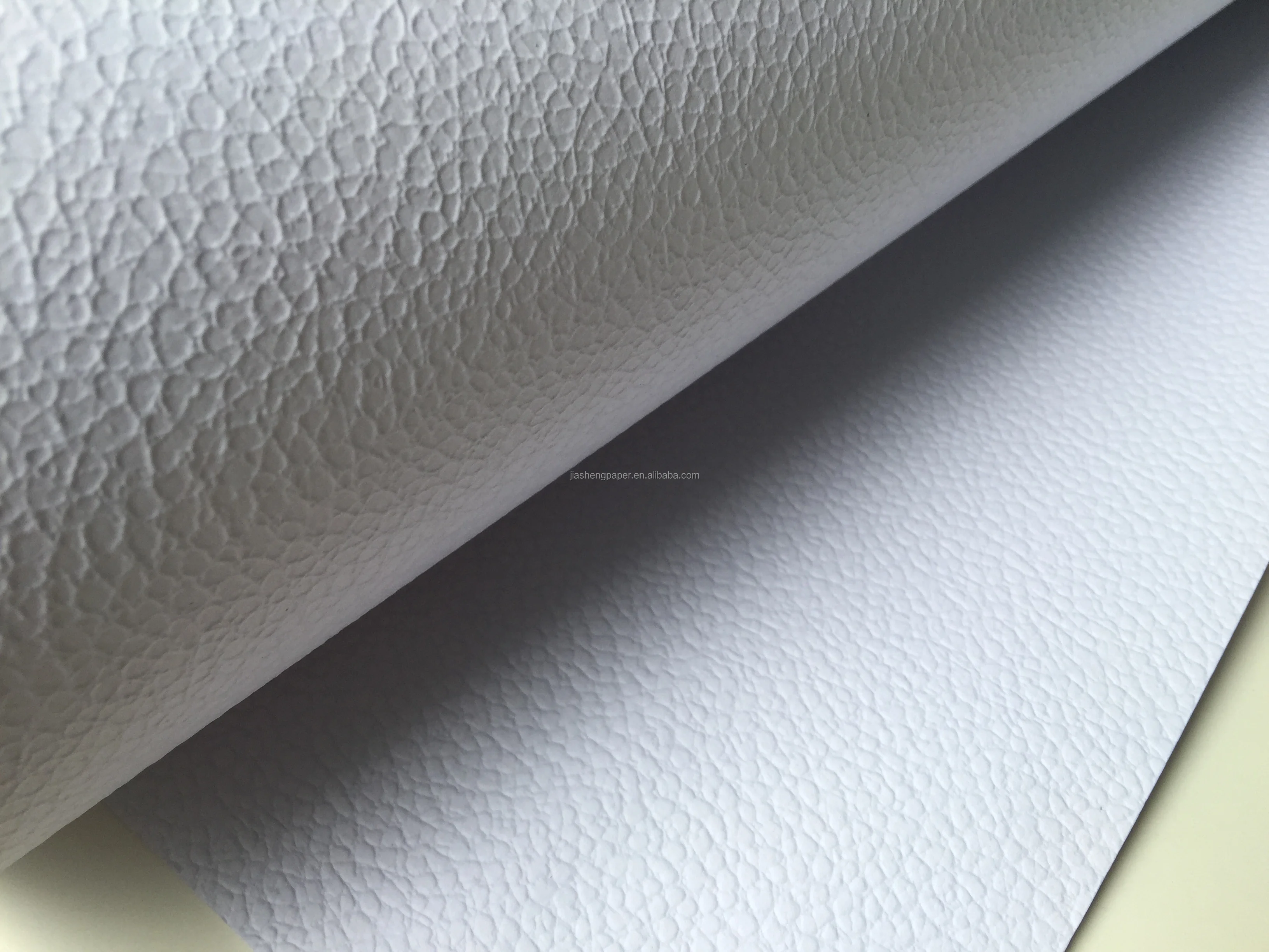 
250g Brilliant White Embossed paper, perfume box cover paper, gift wrapping paper 