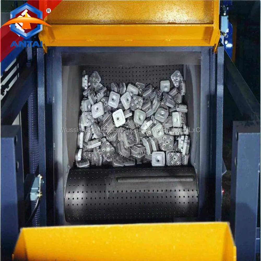 Drum type shot blaster with belt conveyor