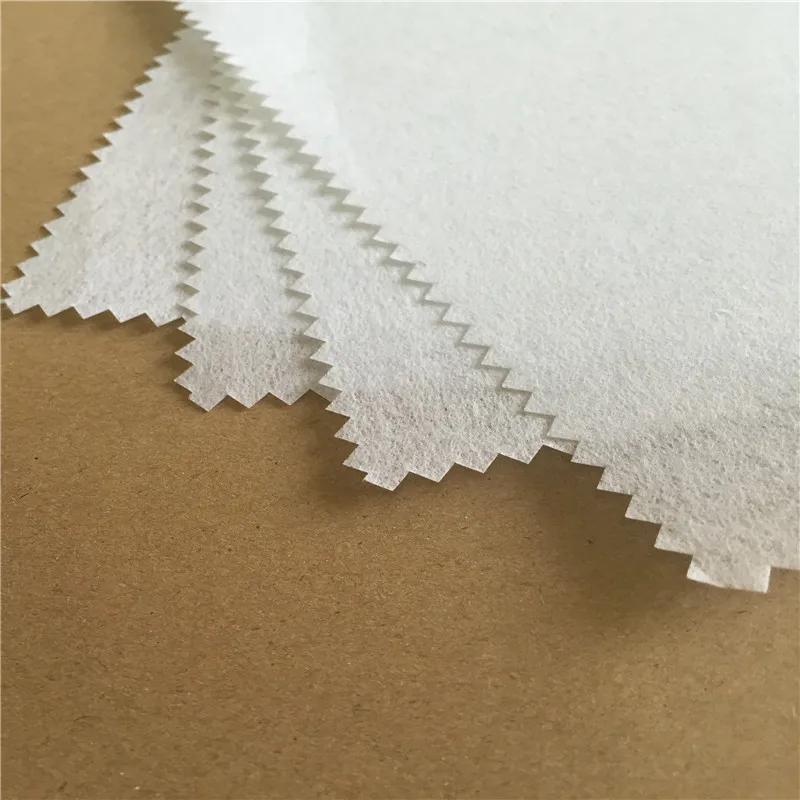 
100% polyester/ embroidery backing paper in cotton/ cutaway adhesive bonded interlining or interfacing 