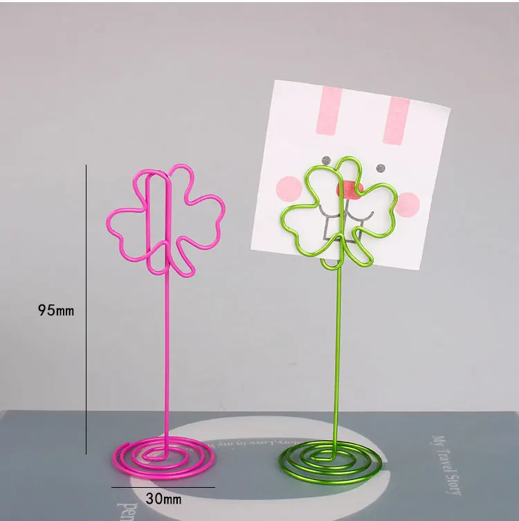 Metal wire shaped restaurant menu holder