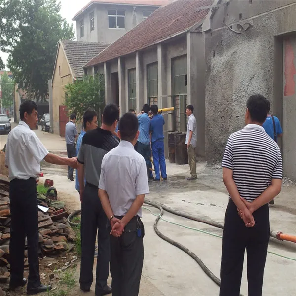 concrete and cement spray on the wall and with diesel engine power machine