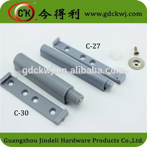 opening the door to catch a magnet for the office and closet