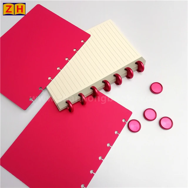 Discbound notebook with dot grid, lined, blank, organizer pages