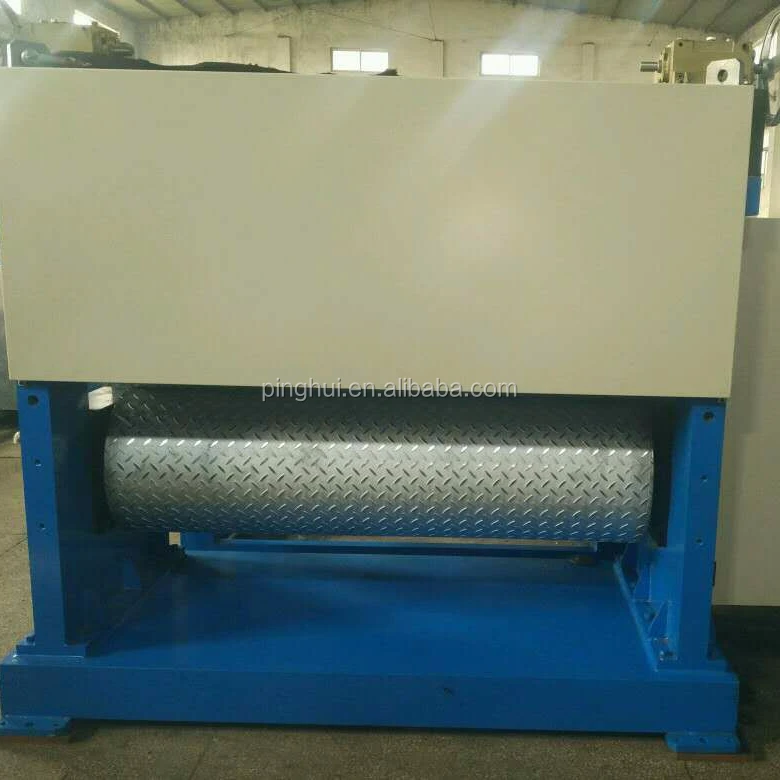Metal rolling embossing machine