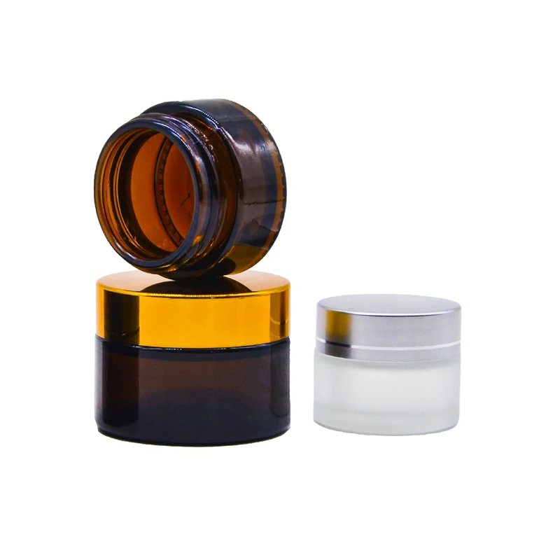 
Empty 30g 50g 100g amber glass cream jar with black plastic lid 
