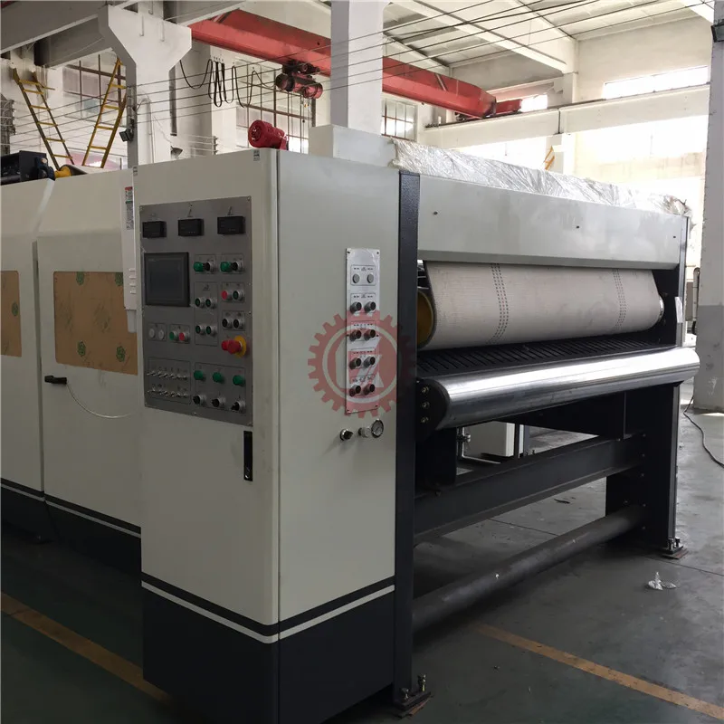 Машина для производства картонных коробок с двойным излучением