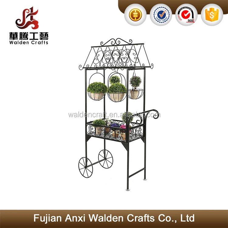 Large black metal freestanding scrollwork french trolley cart plant stand with hanging flower pot baskets