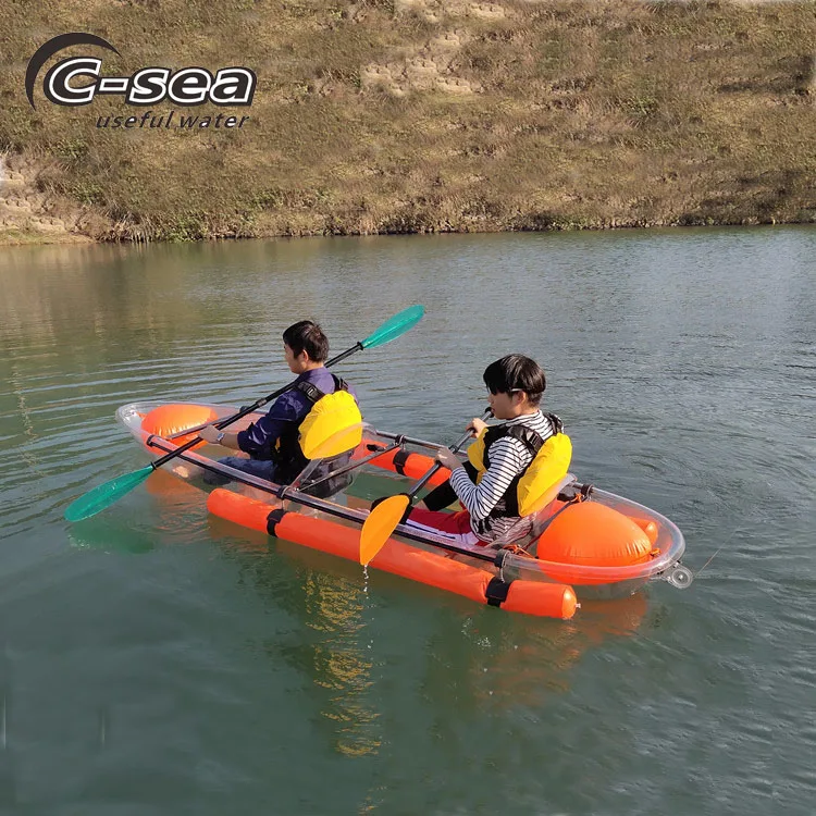 2 person sit in clear bottom kayak