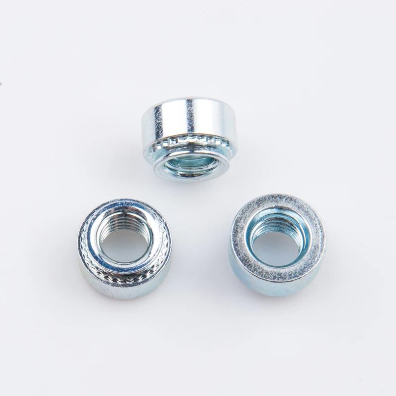 China Manufacturer Carbon Steel Zinc Plated Clinching Nuts