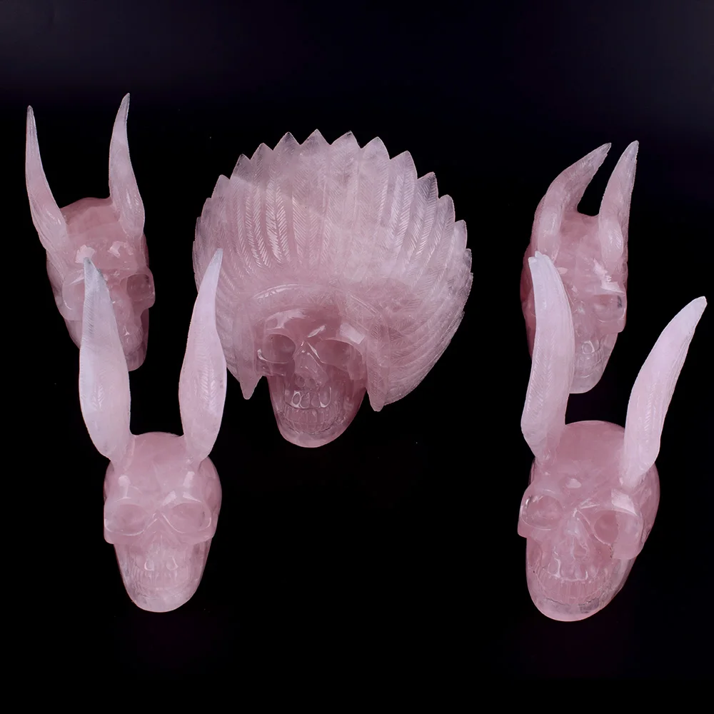 Natural rose quartz crystal hand carved Alien and Wing skull Sculpture for sale