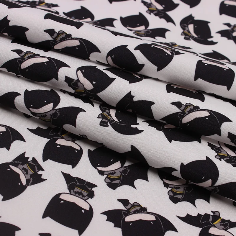 In stock twill peach skin fabric with cartoon batman print for children jacket