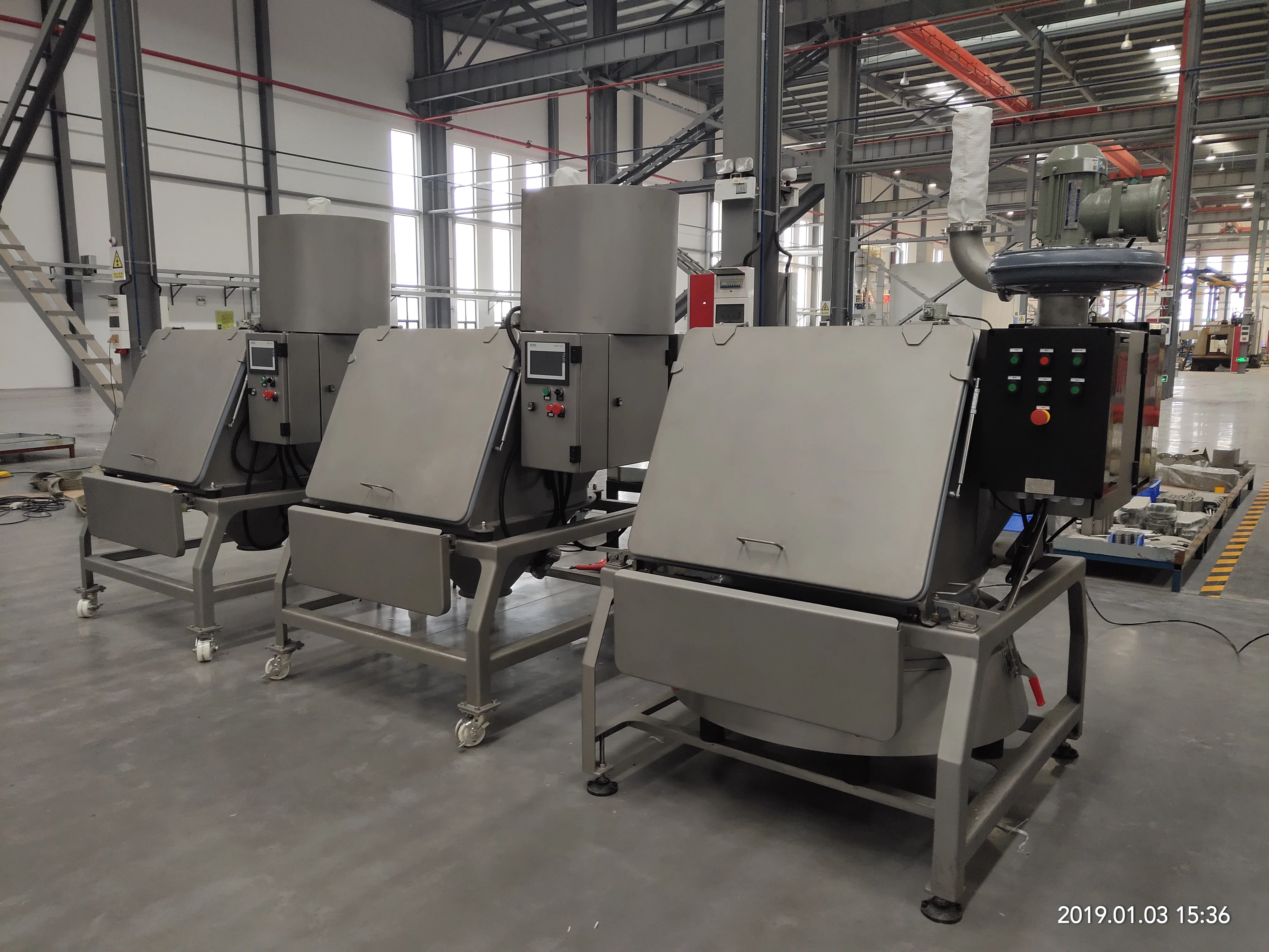 
Powder material bag dump station 