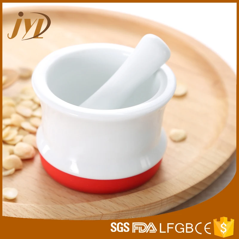 
China factory new design mini size herb spice small ceramic mortar and pestle with Silicone anti-skid ring 