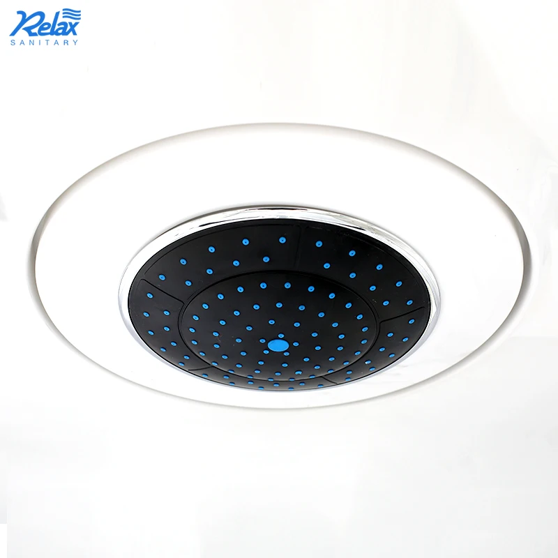 A simple designed bathroom shower room with a white steam shower stall and a walk-in shower room