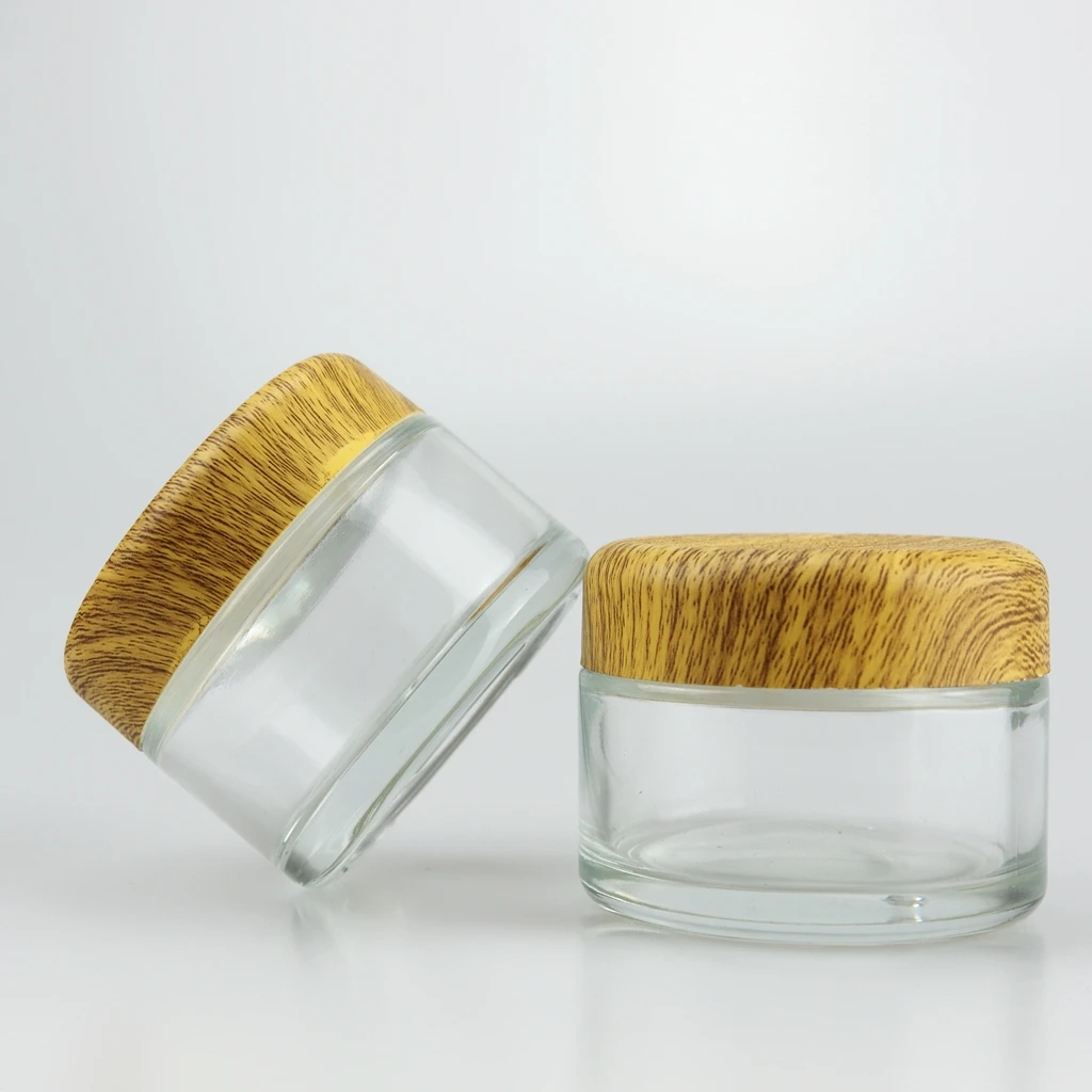 
New arrival 5ml 50ml 70ml 110ml custom child proof weed violet glass jar container with CRC cap/lid 