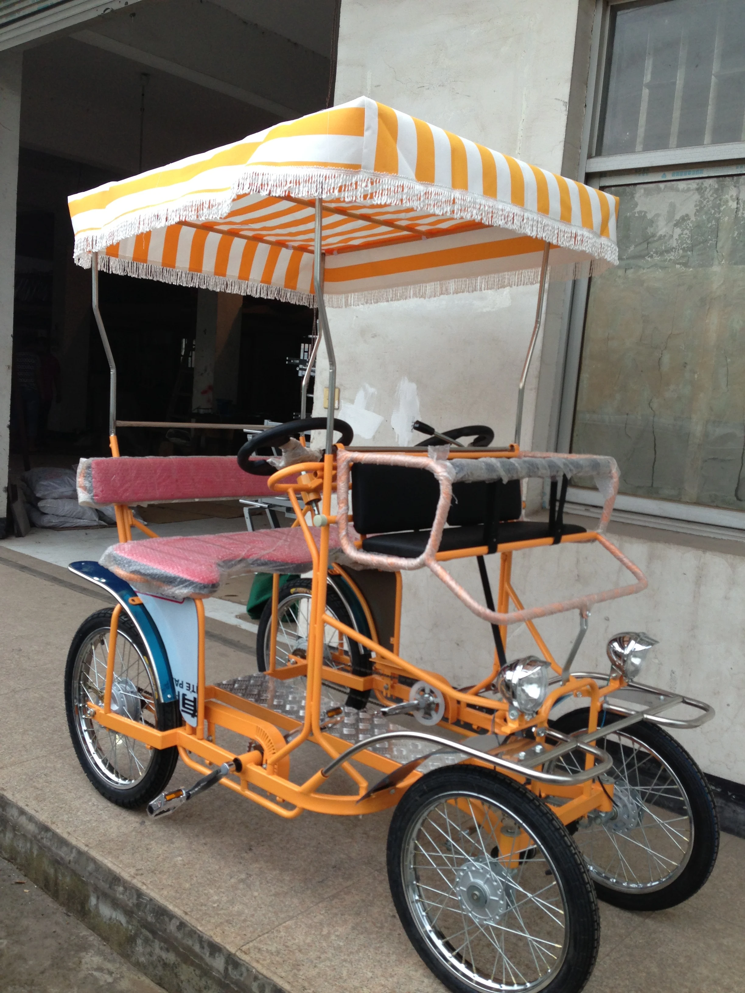 manufacturer  DELUXE 2ADULTS  SURREY BIKE WITH LED LIGHT AND FRONT BABY SEAT