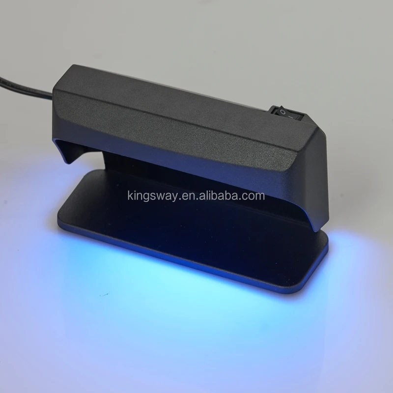 Ultraviolet money detector.