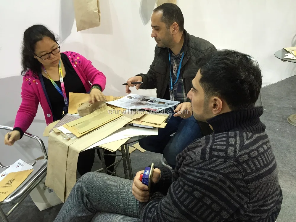 Fully automatic non-woven and paper bag making machine with handle attach with printing