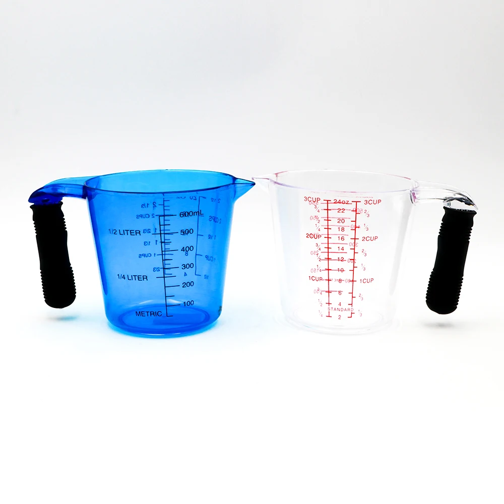 
Kitchen 600ml plastic measuring cup with TPR handle PS measuring jug with OEM 4 sizes spoons 