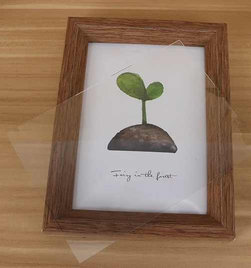 Manufacturers sell vintage PS photo frame hanging on the wall