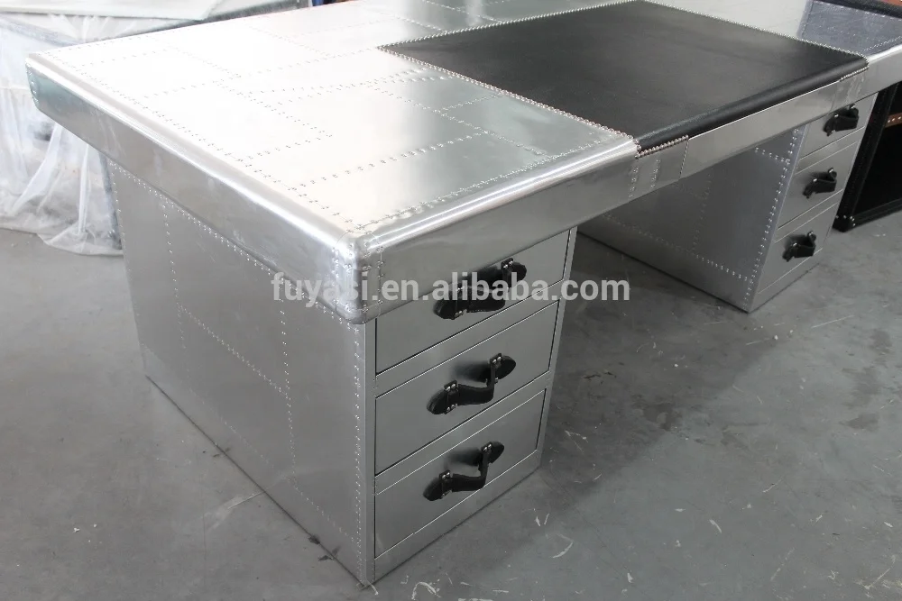 
aviator aluminum and leather covering office desk 