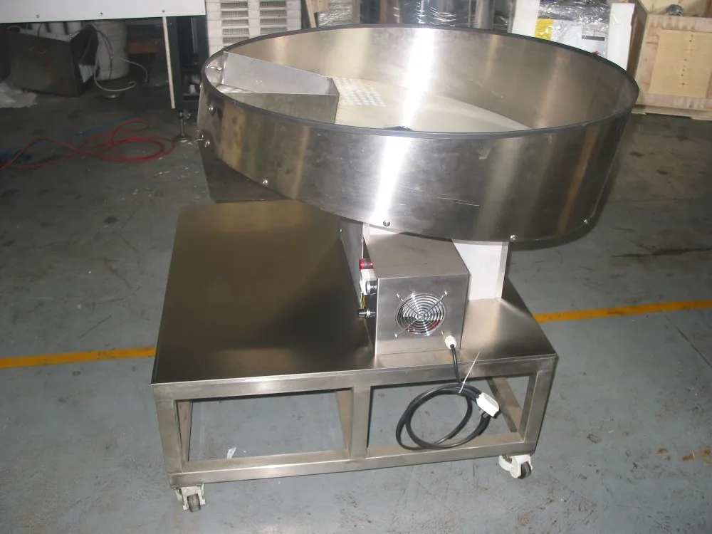 Round Plate PCM 1000  paintball countting and packing machine for the paitnball  encapsulation production line