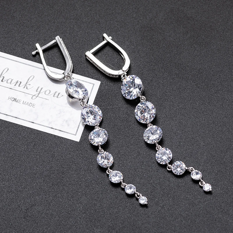 Женские длинные серьги-подвески с фианитами золотистого/серебристого цвета