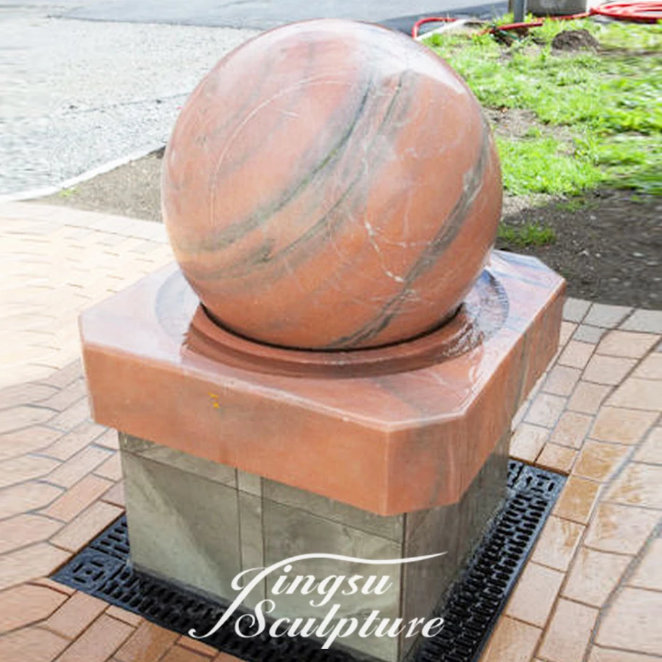 Hand carved granite spinning ball water fountain