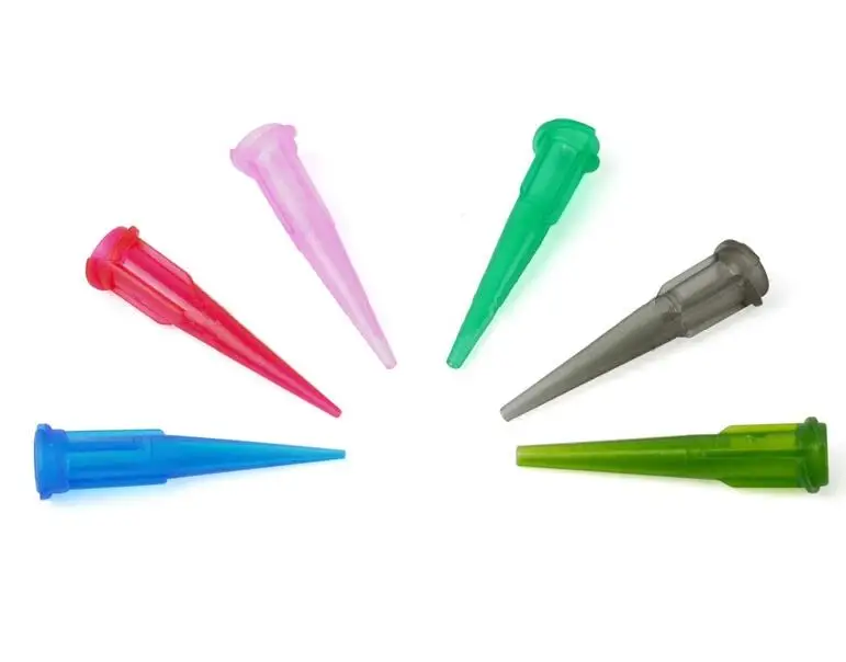 Smooth flow tapered dispensing tips