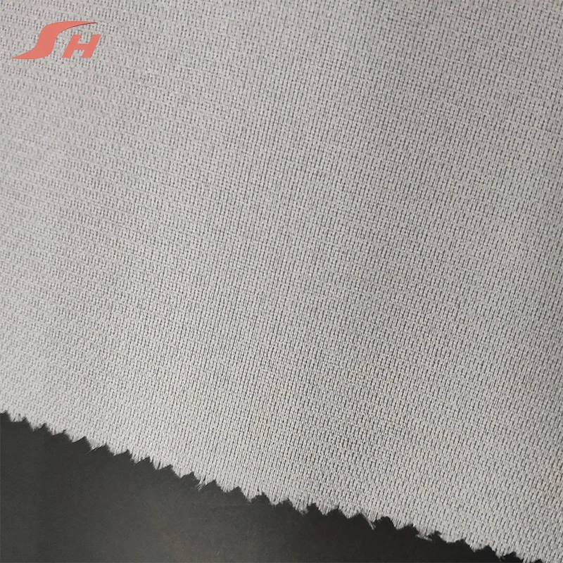 China manufacturer PES microdot clothing 100 polyester woven interlining