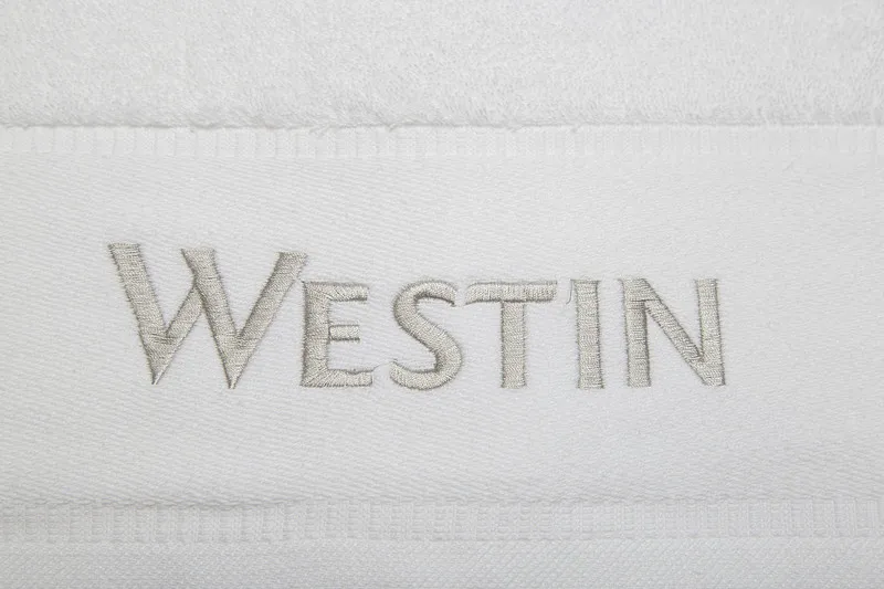 White towels with logo for Westin hotel