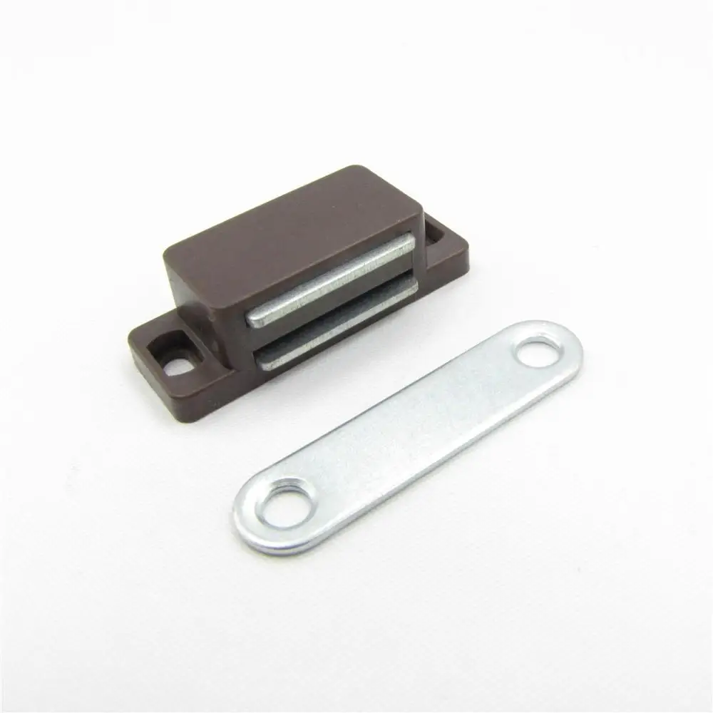 Magnetic door catcher with plastic housing