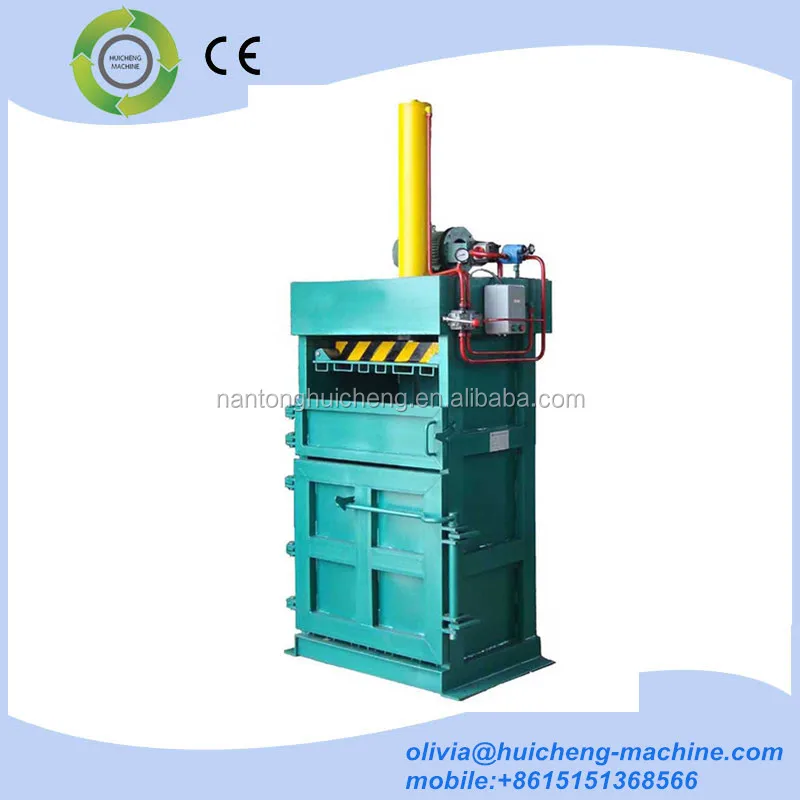 Plastic scrap, paper, cotton and woodchips compress baler machine
