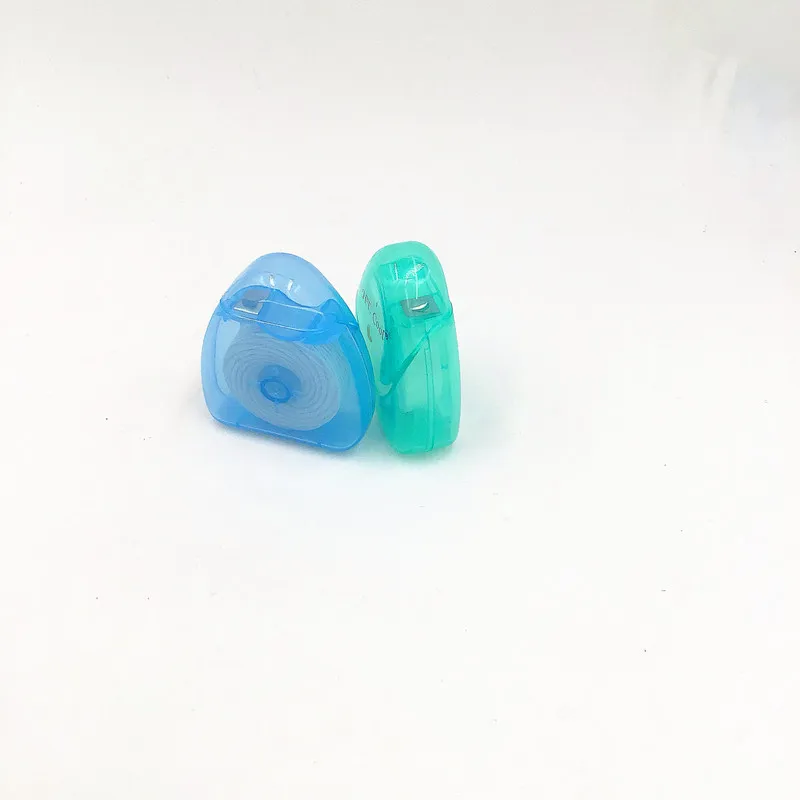 Oral Care Dental Floss 50m Triangle Dispenser in Blister Card Mint Flavored Unwaxed for Teeth Cleaning