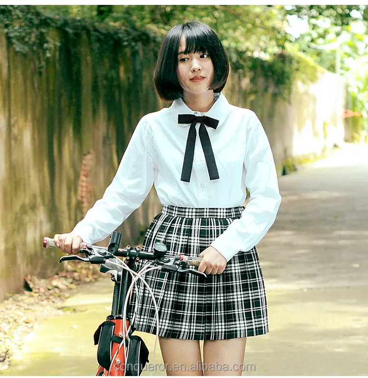 Wholesale School Uniform with skirt, shirt and tie.