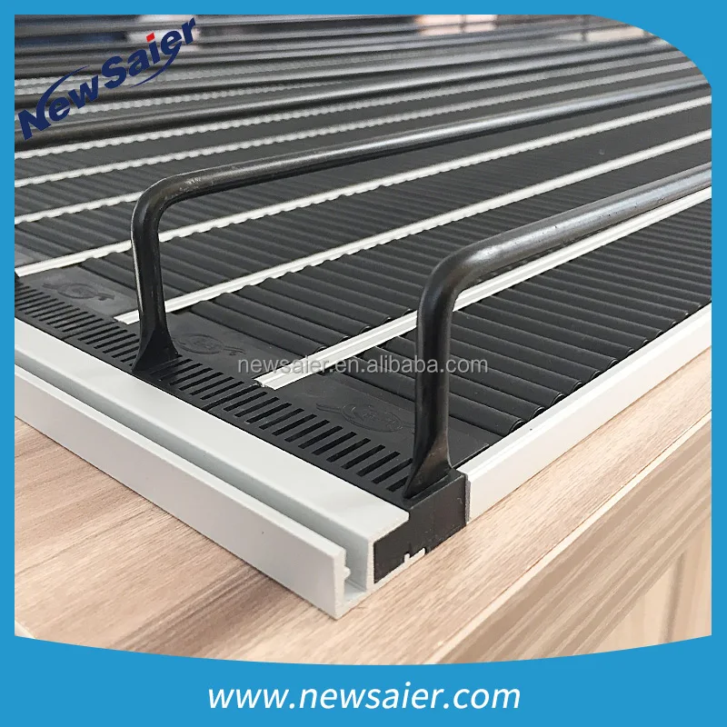 roller track conveyor with shelf stopper