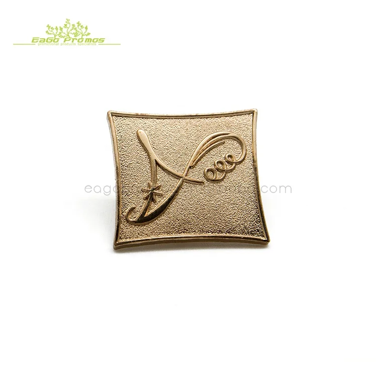 2023 shanghai eago promos free sample mini order branded logo embossed hard/soft enamel metal badge with epoxy