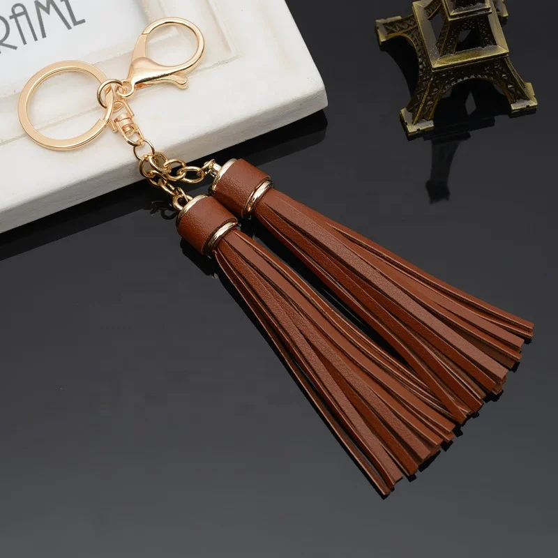 leather handbag tassel with key chain key finder