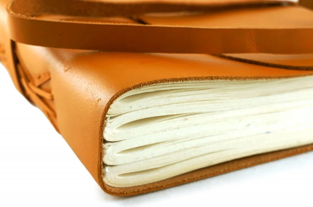 Elegant handmade personalized leather notebook amber orange large strap closure genuine leather journal cover