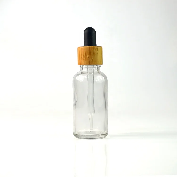 Cosmetic serum packaging 10ml 15ml 30ml 50ml 100ml amber blue green clear glass essential oil dropper bottle with bamboo cap