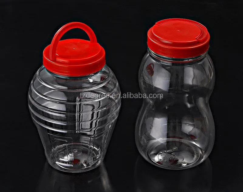 Automatic hand feeding pet wide-neck jar stretch blow molding machine